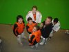 Une partie de l'équipe minimes de Metz Judo Jujitsu avec leur coach Patrick